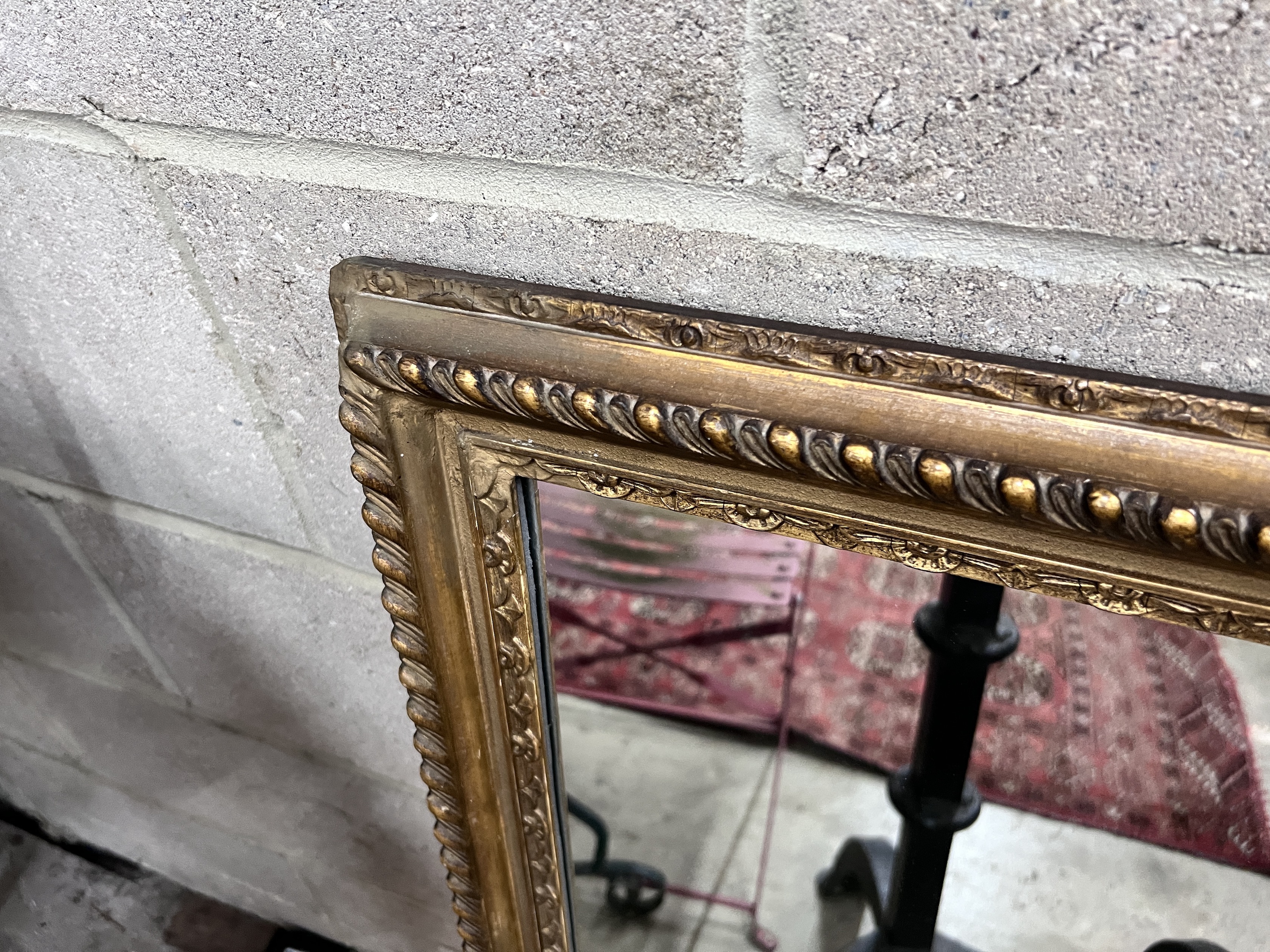 An early 20th century rectangular gilt framed wall mirror, width 66cm, height 91cm